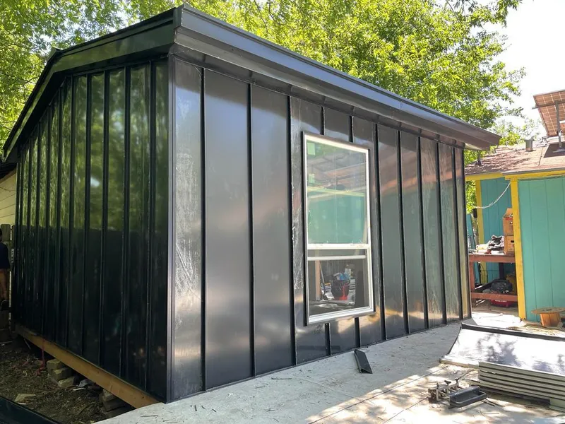 Black standing seam metal wall panels for Roof Inspection in Upper Arlington